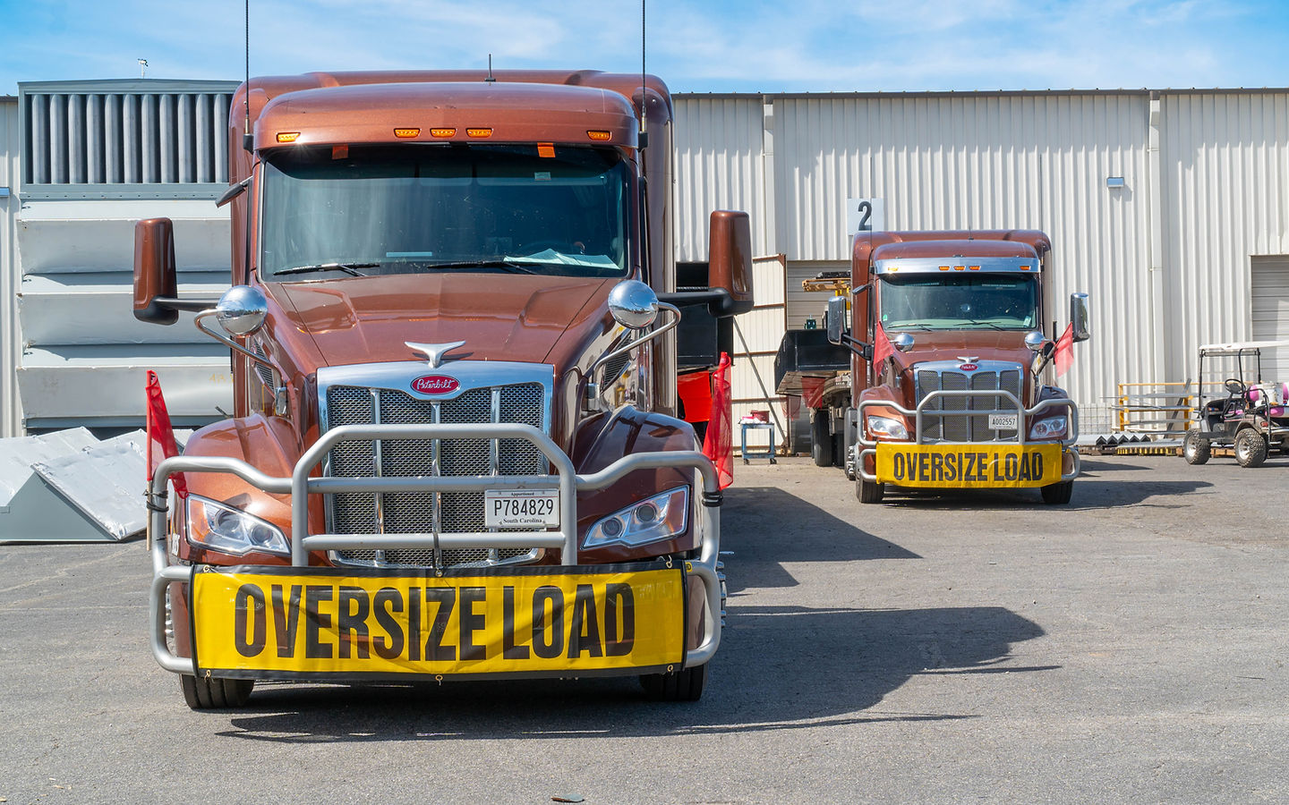Heavy haul trucks at warehouse