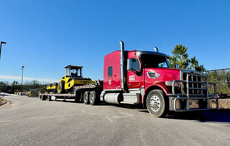 Heavy haul truck with equipment